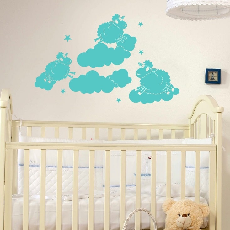 Wallsticker Får der hopper rundt i skyerne